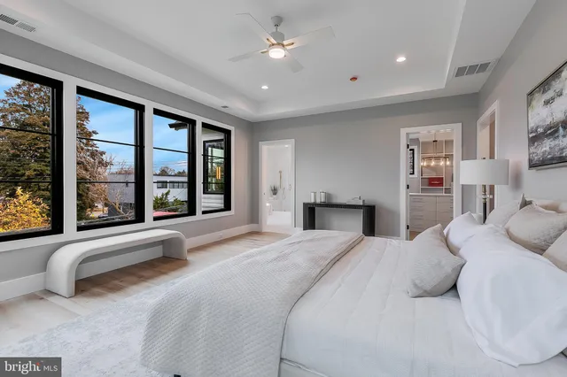 a kitchen with stainless steel appliances granite countertop a refrigerator and a stove
