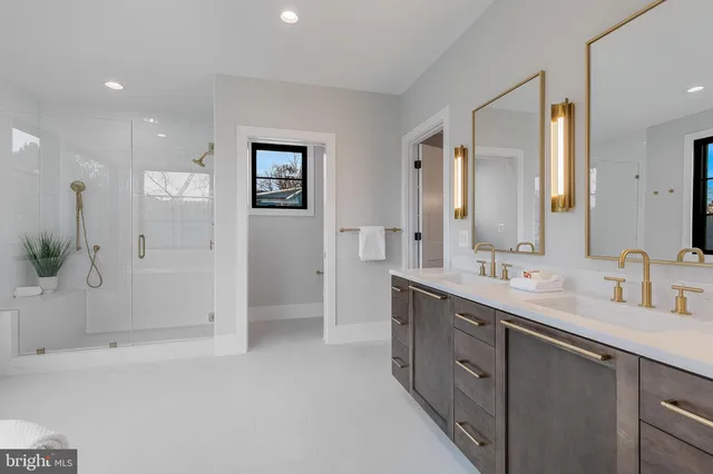 a living room with furniture potted plant and a window