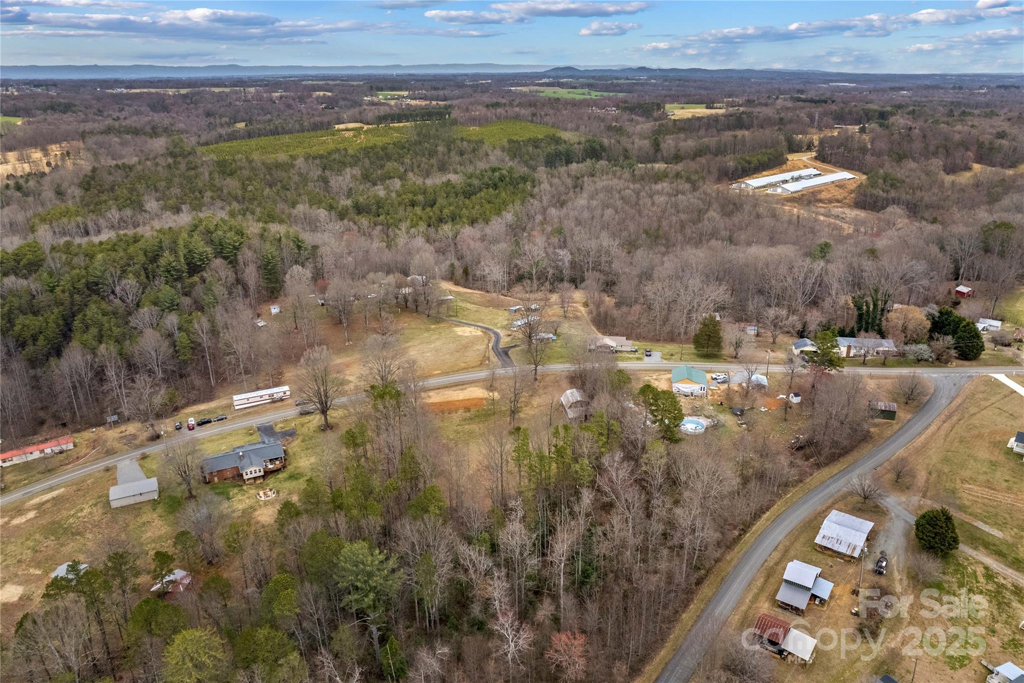 0 Stanley Mill Road, Unit 3 Elkin, NC 28621 - Photo 12 of 12 a view of a yard with an outdoor space