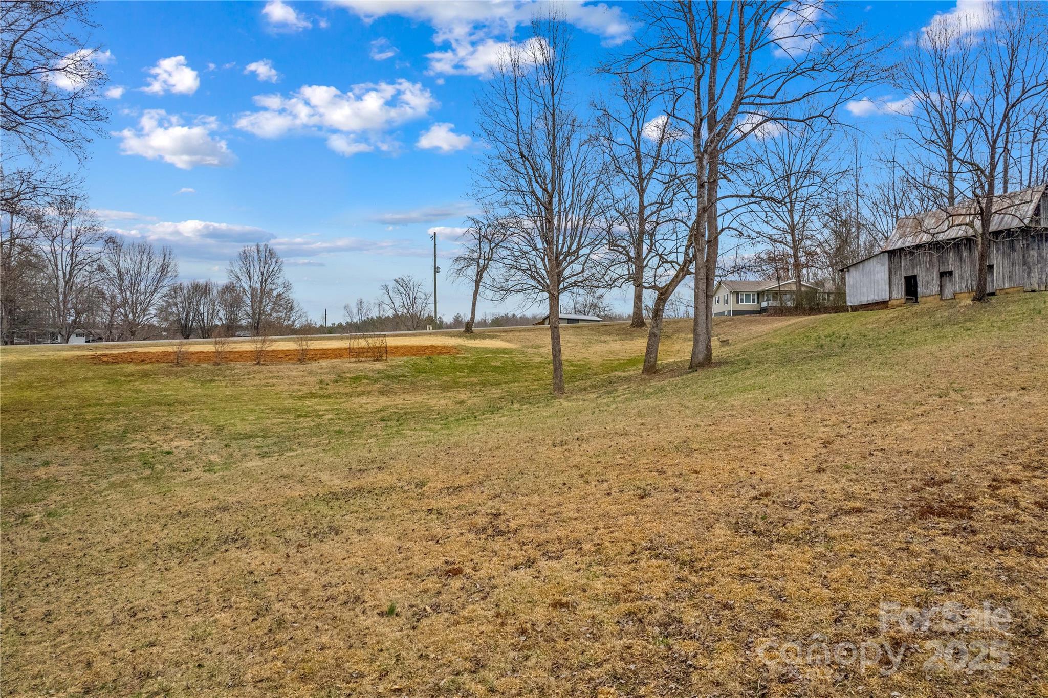 0 Stanley Mill Road, Unit 3 Elkin, NC 28621 - Photo 5 of 12 a view of a yard with a house