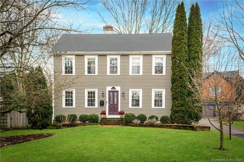 4 Abbott Avenue Ridgefield, CT 06877 - Photo 1 of 1 front view of a house with a yard