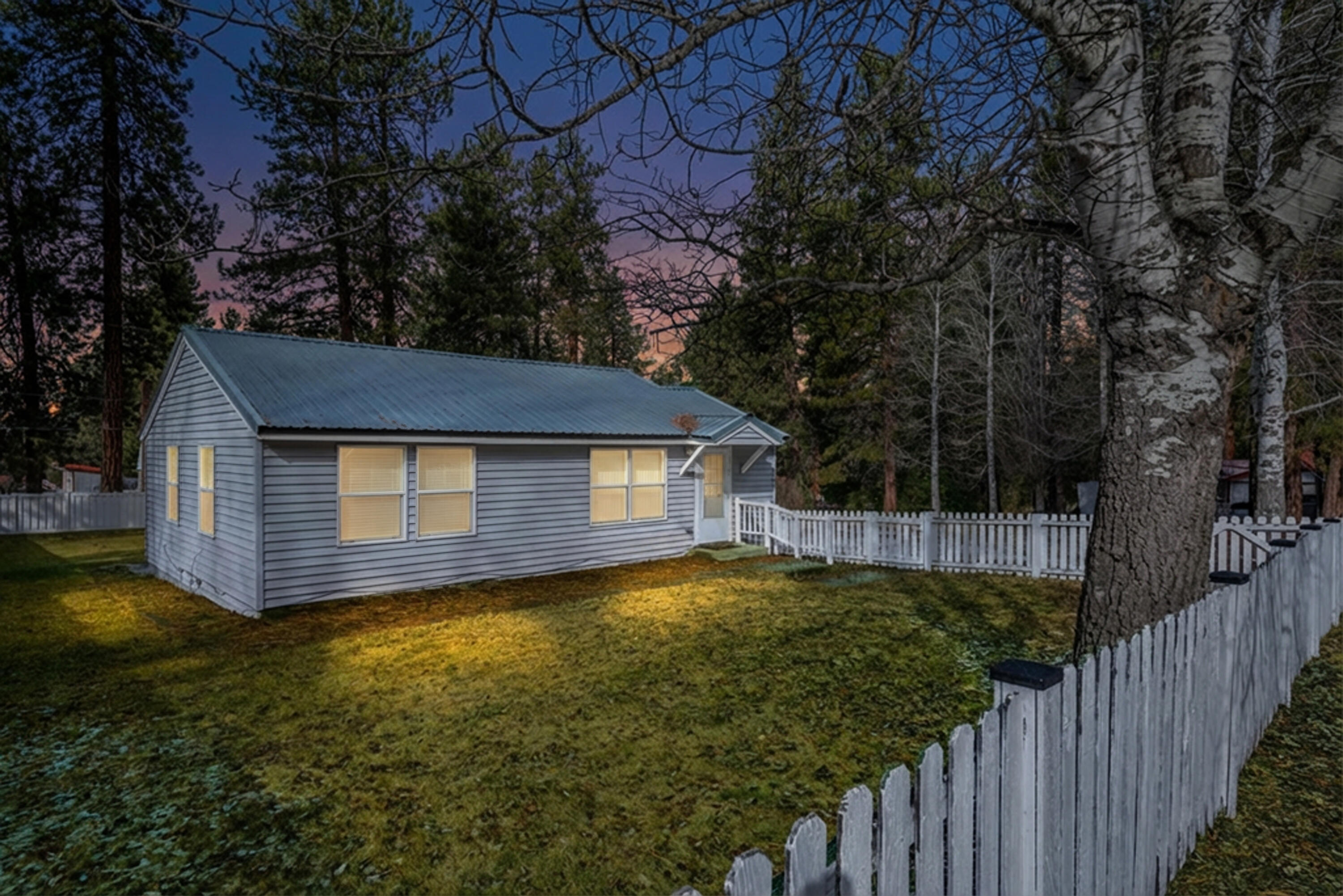 138722 Rhododendron Street Gilchrist, OR 97737 - Photo 33 of 36 a view of a house with a yard