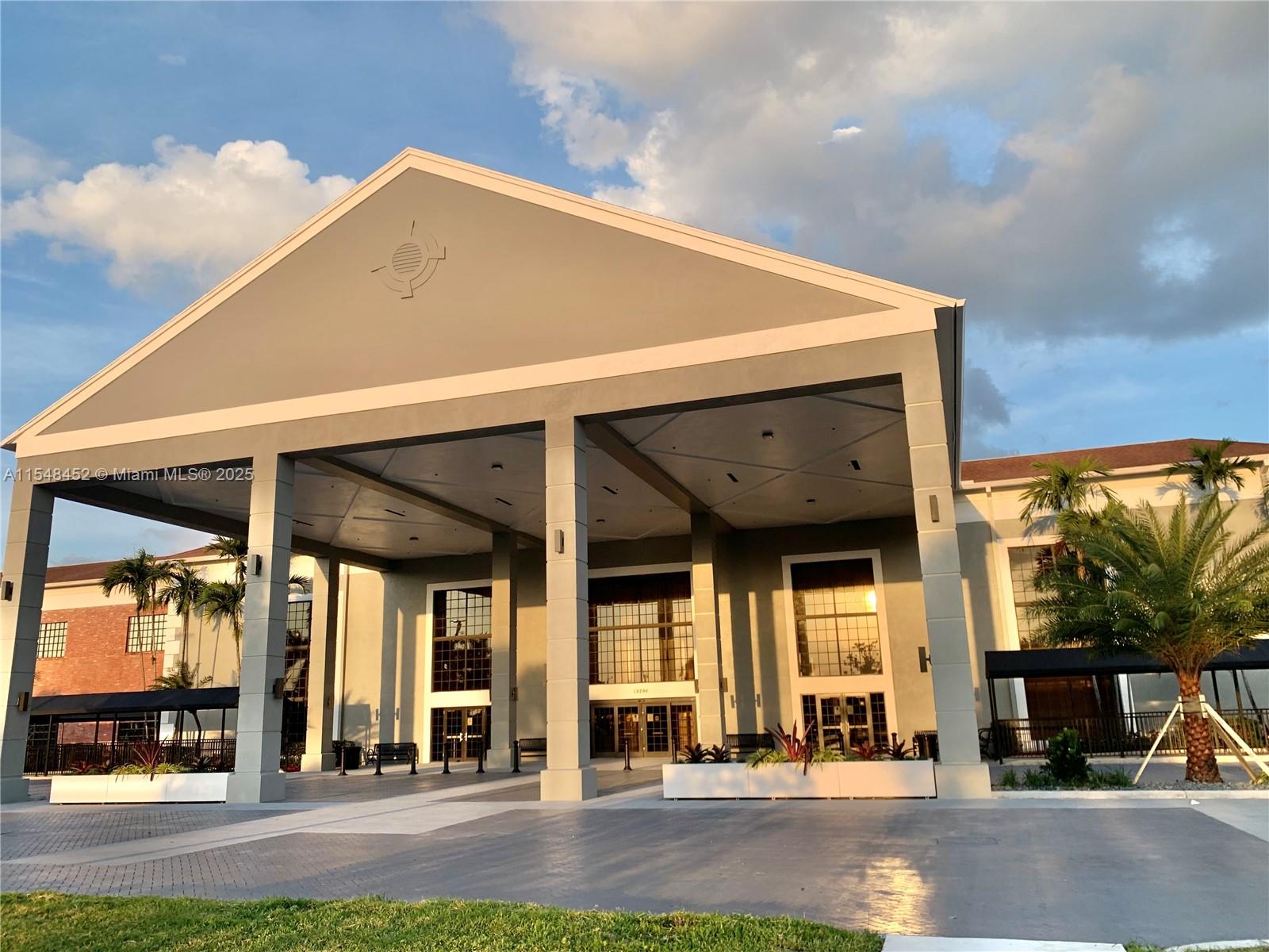 95 Preston F, Unit 95 Boca Raton, FL 33434 - Photo 54 of 65 a view of a house with a porch
