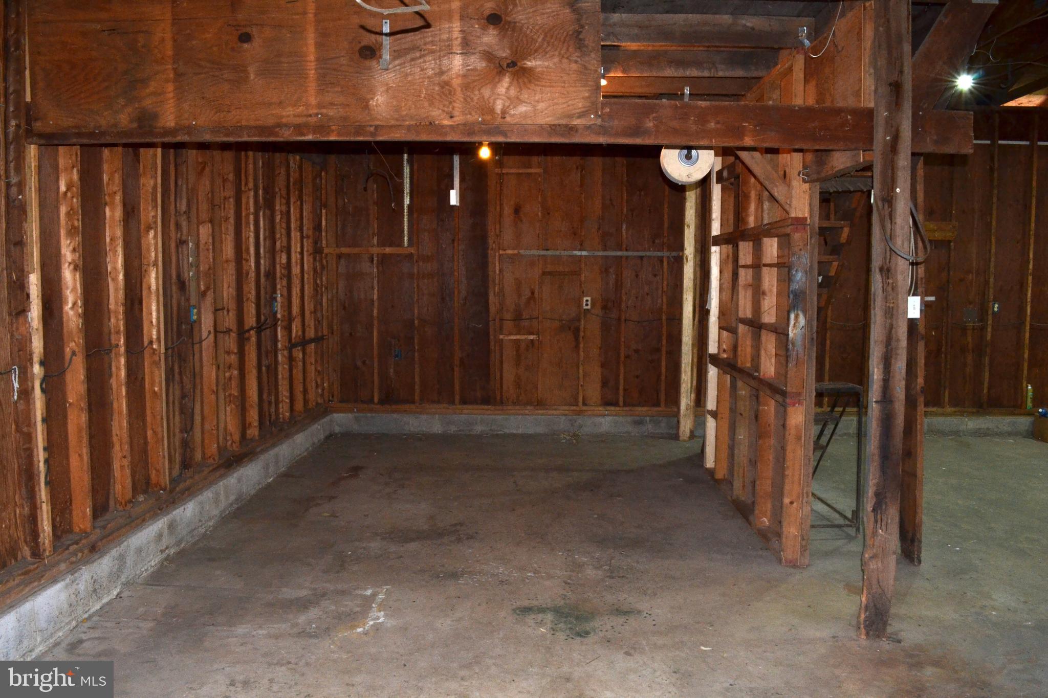 1241 Duke Lane Odenton, MD 21113 - Photo 22 of 26 a view of empty room with wooden walls