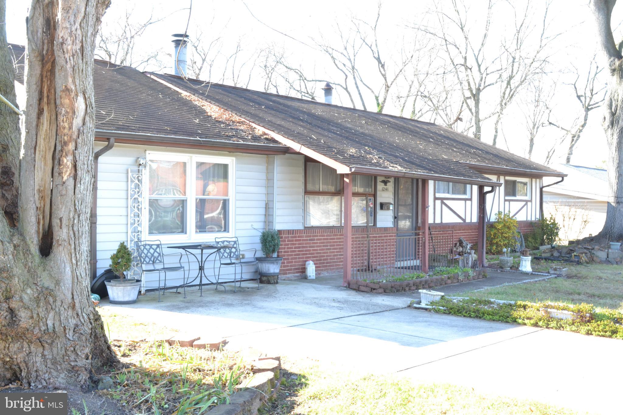 1241 Duke Lane Odenton, MD 21113 - Photo 3 of 26 a view of a house with backyard and sitting area