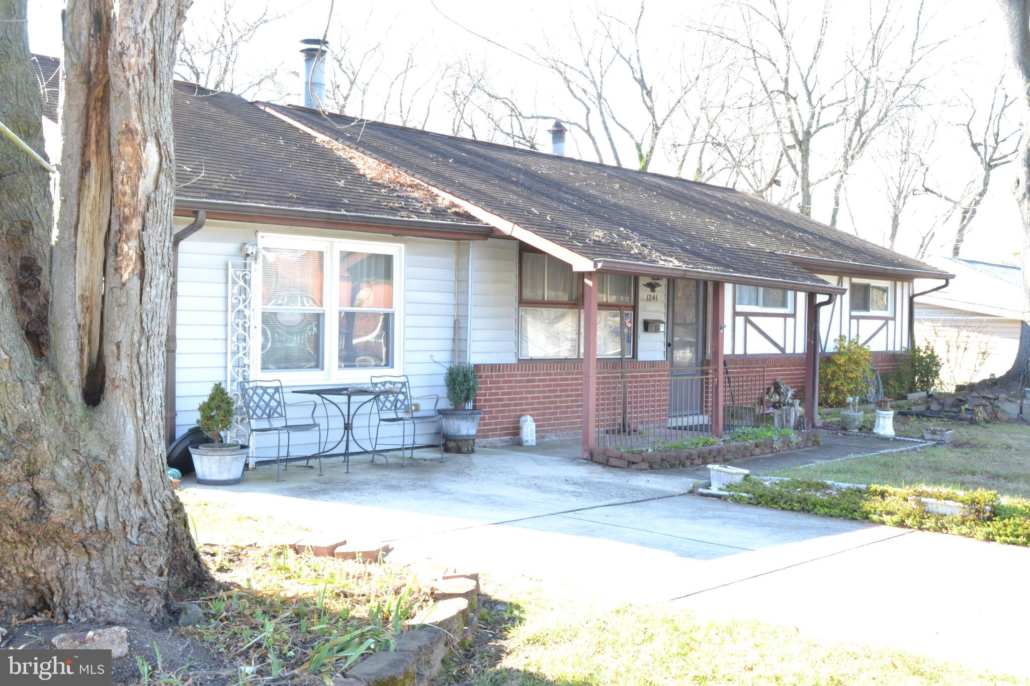 1241 Duke Lane Odenton, MD 21113 - Photo 4 of 26 a view of a house with backyard and sitting area