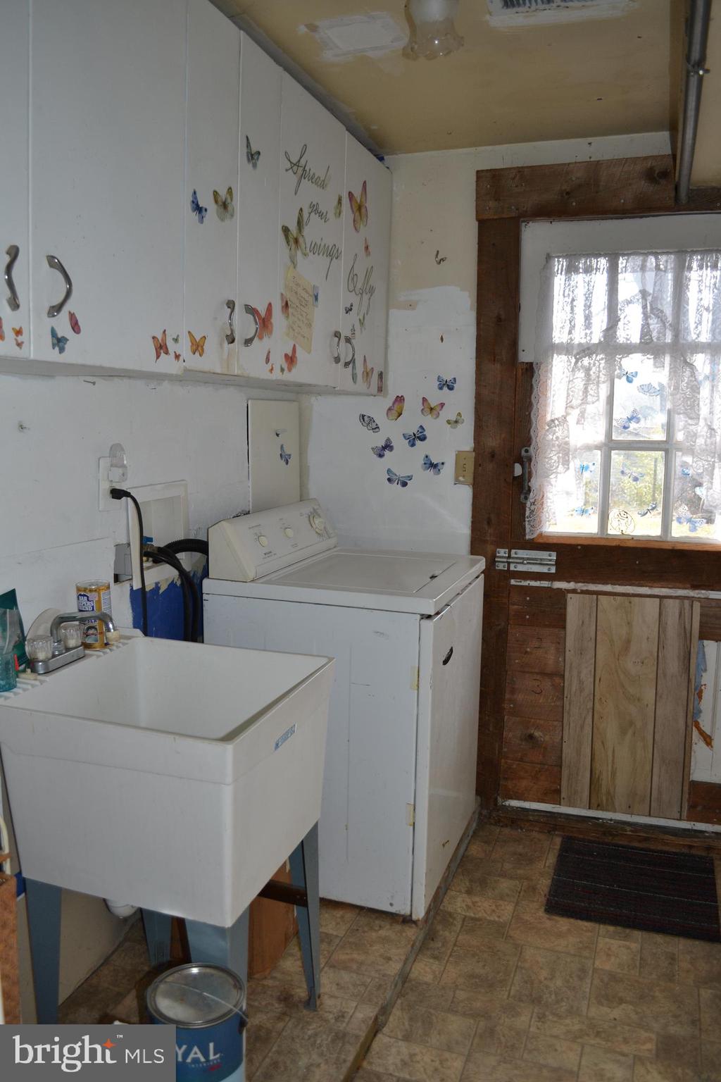 1241 Duke Lane Odenton, MD 21113 - Photo 8 of 26 a kitchen with a sink and cabinets