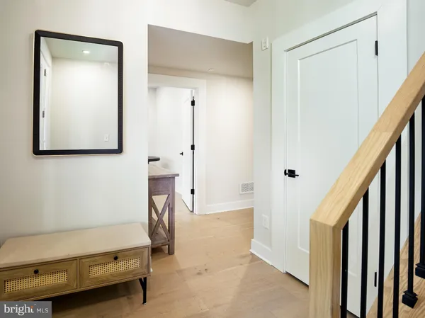 a view of a hallway with entryway