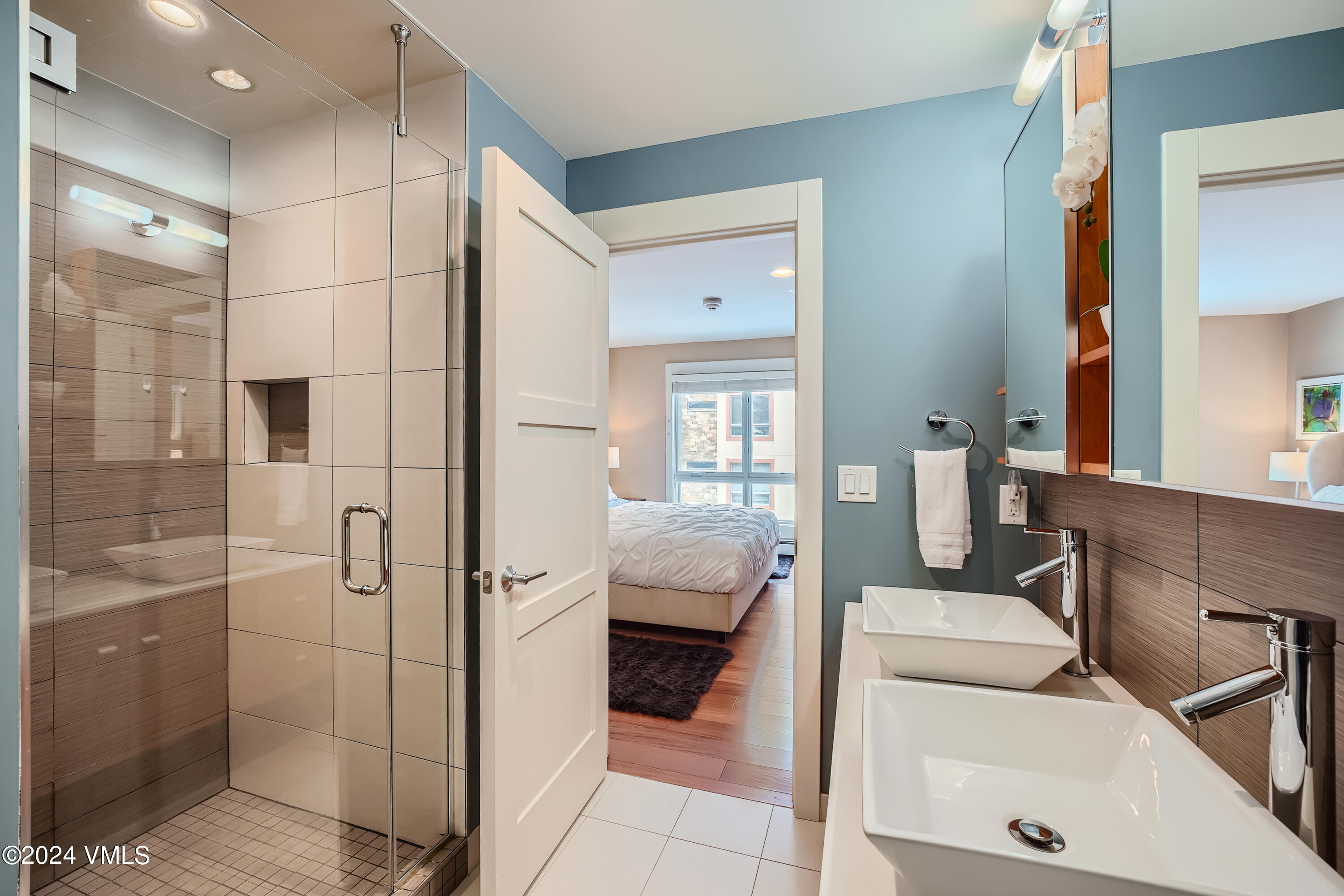 963 Lions Ridge Loop, Unit 535 Vail, CO 81657 - Photo 16 of 26 a en suite bathroom with a toilet and shower