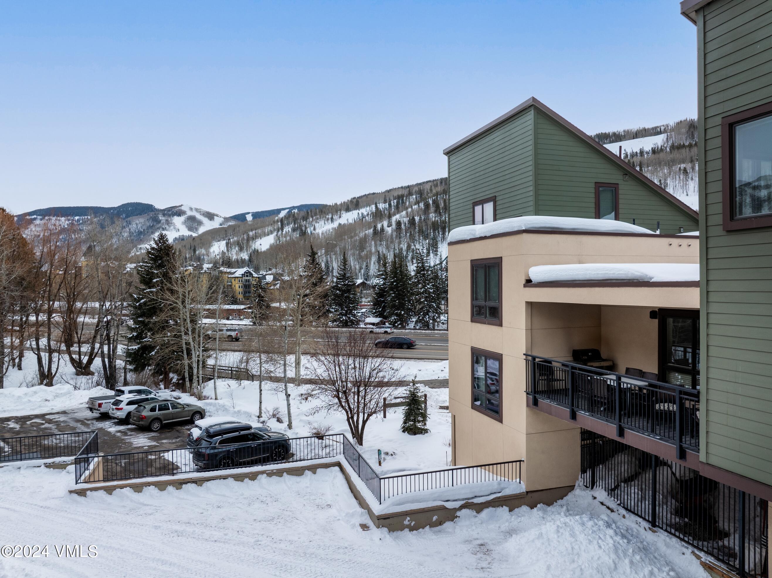 963 Lions Ridge Loop, Unit 535 Vail, CO 81657 - Photo 20 of 26 a view of a terrace with living area