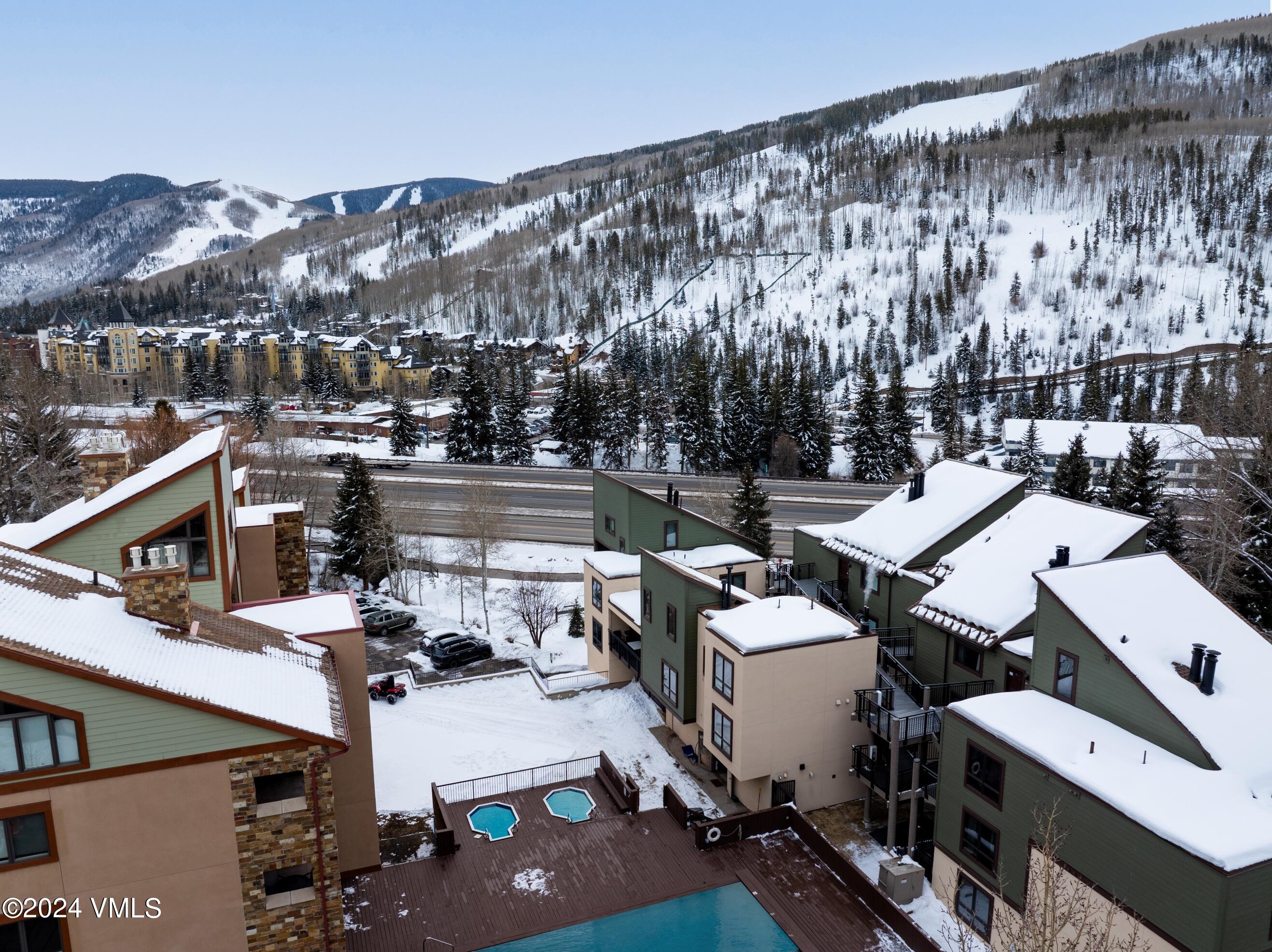 963 Lions Ridge Loop, Unit 535 Vail, CO 81657 - Photo 21 of 26 a view of a city