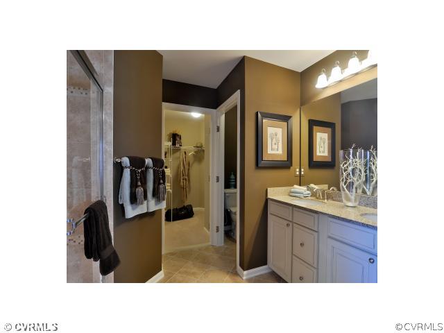 10731 Ethens Mill Road Chester, VA 23831 - Photo 6 of 8 a bathroom with a sink and mirror