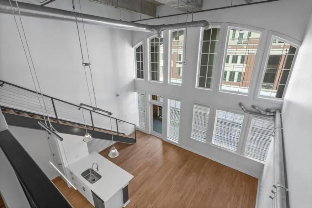 230 18th Street Northwest, Unit 11325 Atlanta, GA 30363 - Photo 29 of 43 a view of a balcony with wooden floor