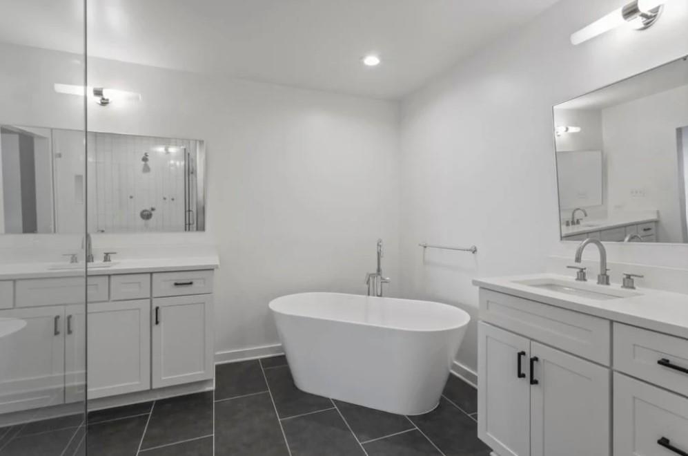 230 18th Street Northwest, Unit 11325 Atlanta, GA 30363 - Photo 32 of 43 a bathroom with a sink and a mirror