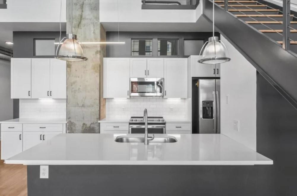 230 18th Street Northwest, Unit 11325 Atlanta, GA 30363 - Photo 4 of 43 a view of kitchen with furniture and refrigerator