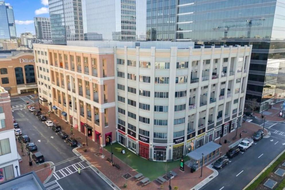 230 18th Street Northwest, Unit 11325 Atlanta, GA 30363 - Photo 6 of 43 a view of a building with a yard