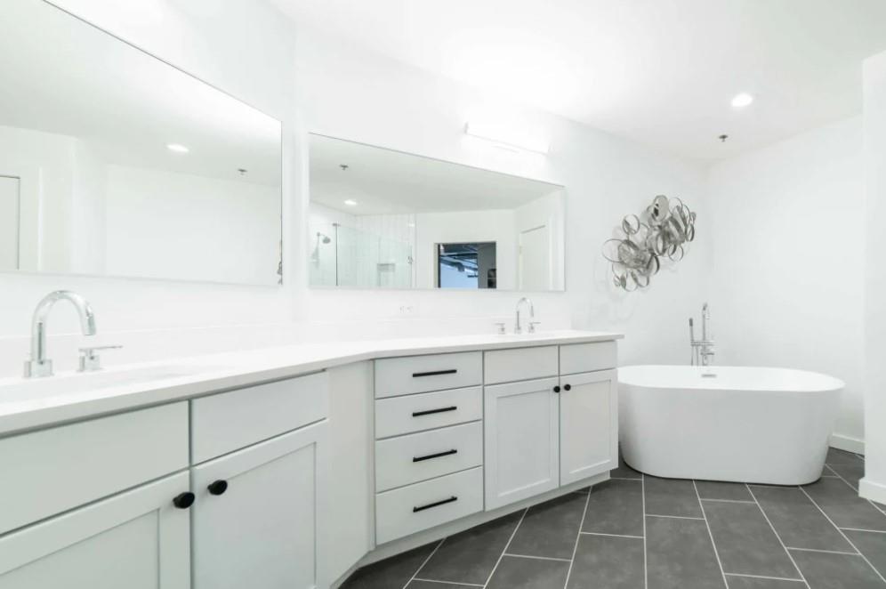 230 18th Street Northwest, Unit 11325 Atlanta, GA 30363 - Photo 10 of 43 a spacious bathroom with a double vanity sink mirror and