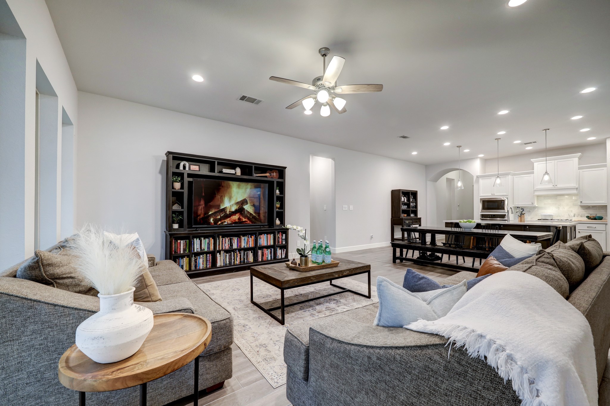 804 Fall Rock Branch Drive Conroe, TX 77304 - Photo 17 of 44 a living room with furniture and a flat screen tv