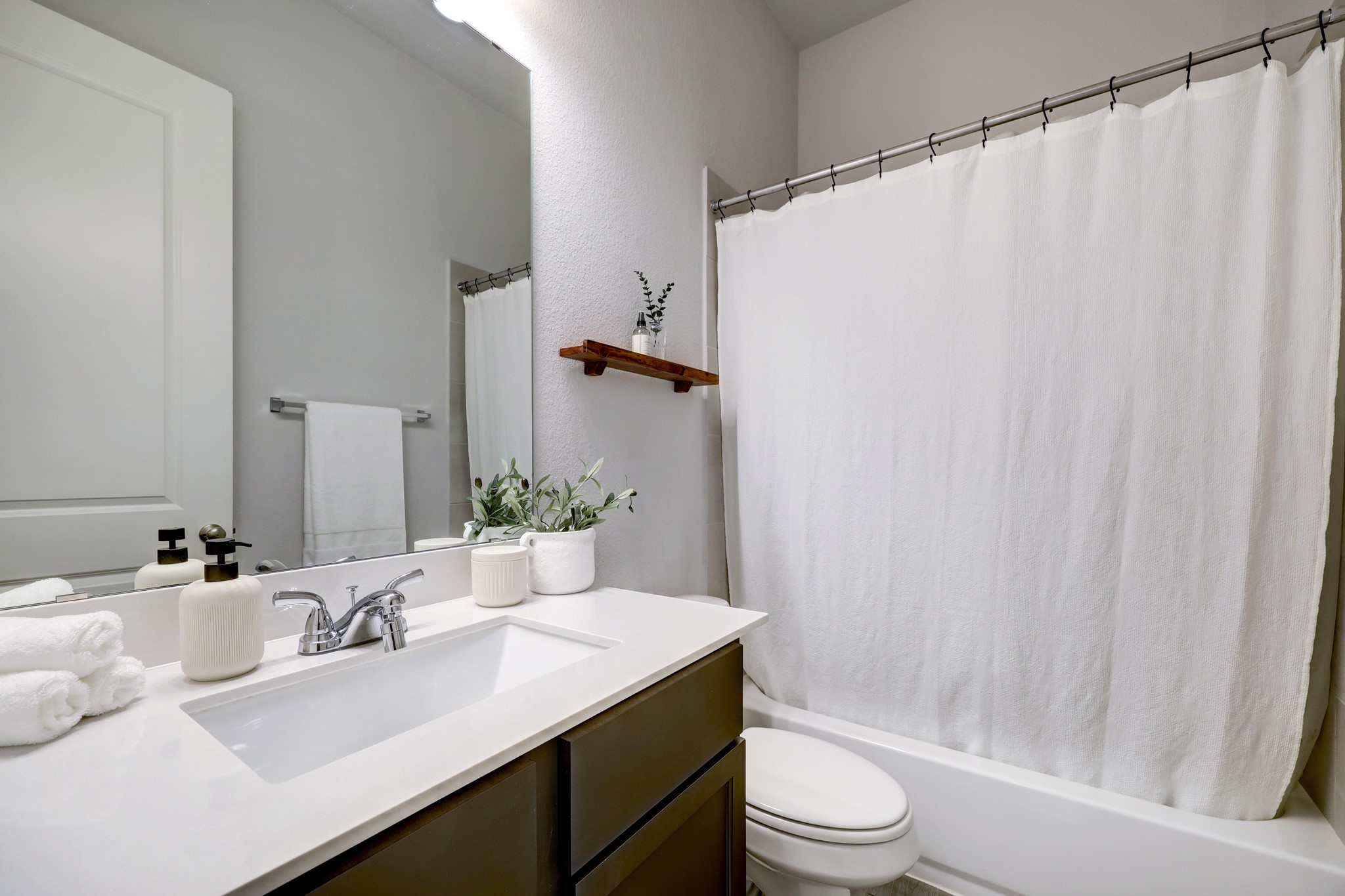 804 Fall Rock Branch Drive Conroe, TX 77304 - Photo 25 of 44 a bathroom with a sink toilet and shower