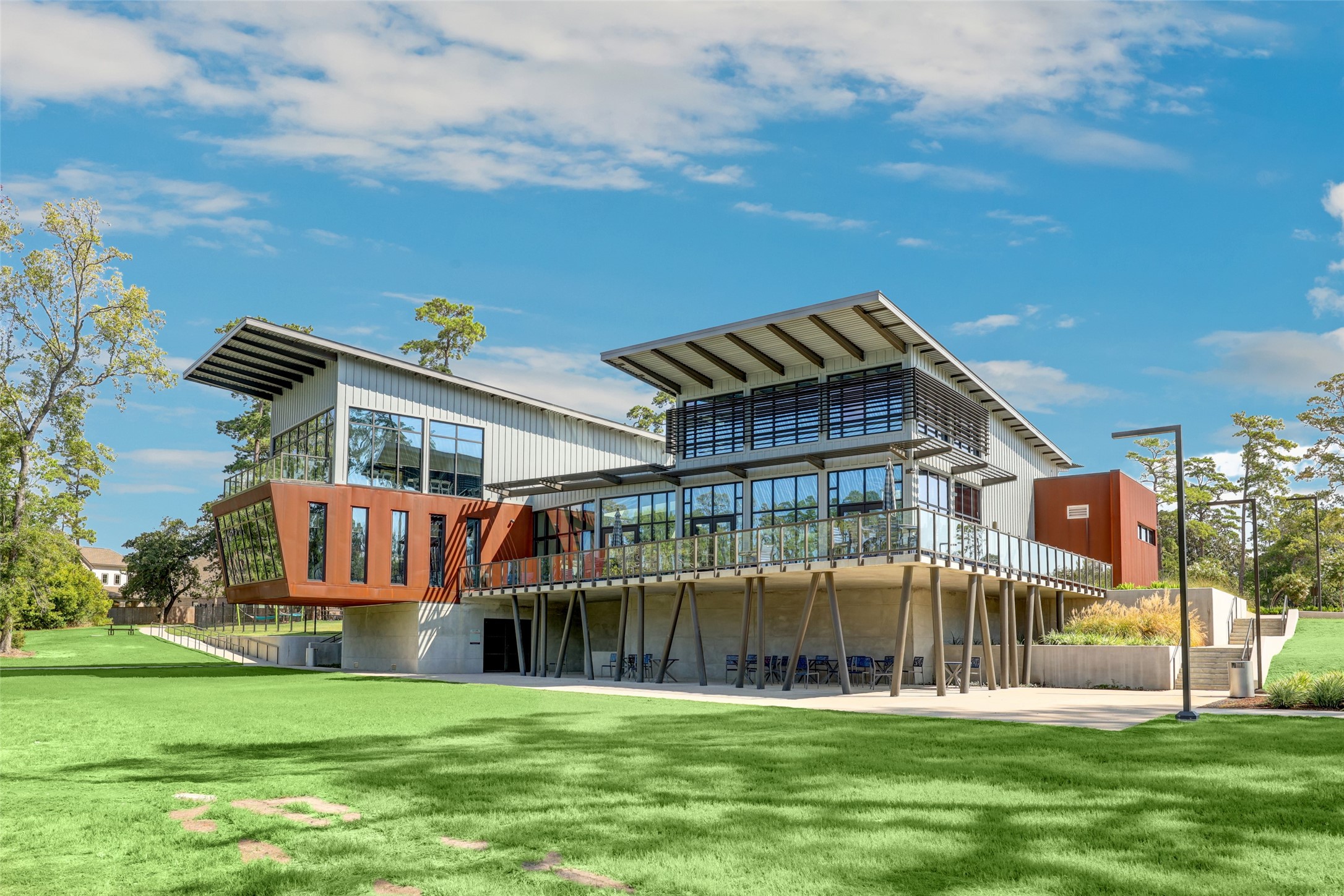 804 Fall Rock Branch Drive Conroe, TX 77304 - Photo 35 of 44 a view of a house next to a big yard with large trees