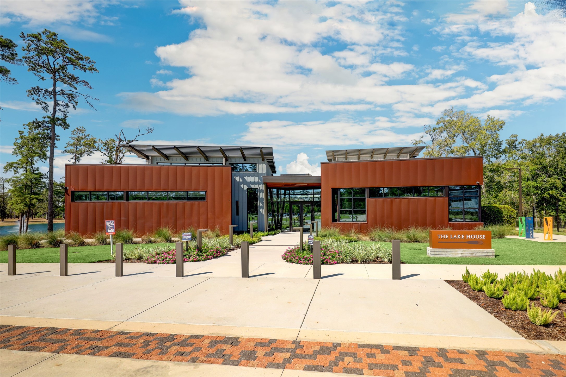 804 Fall Rock Branch Drive Conroe, TX 77304 - Photo 38 of 44 front view of a house with a yard and a car parked