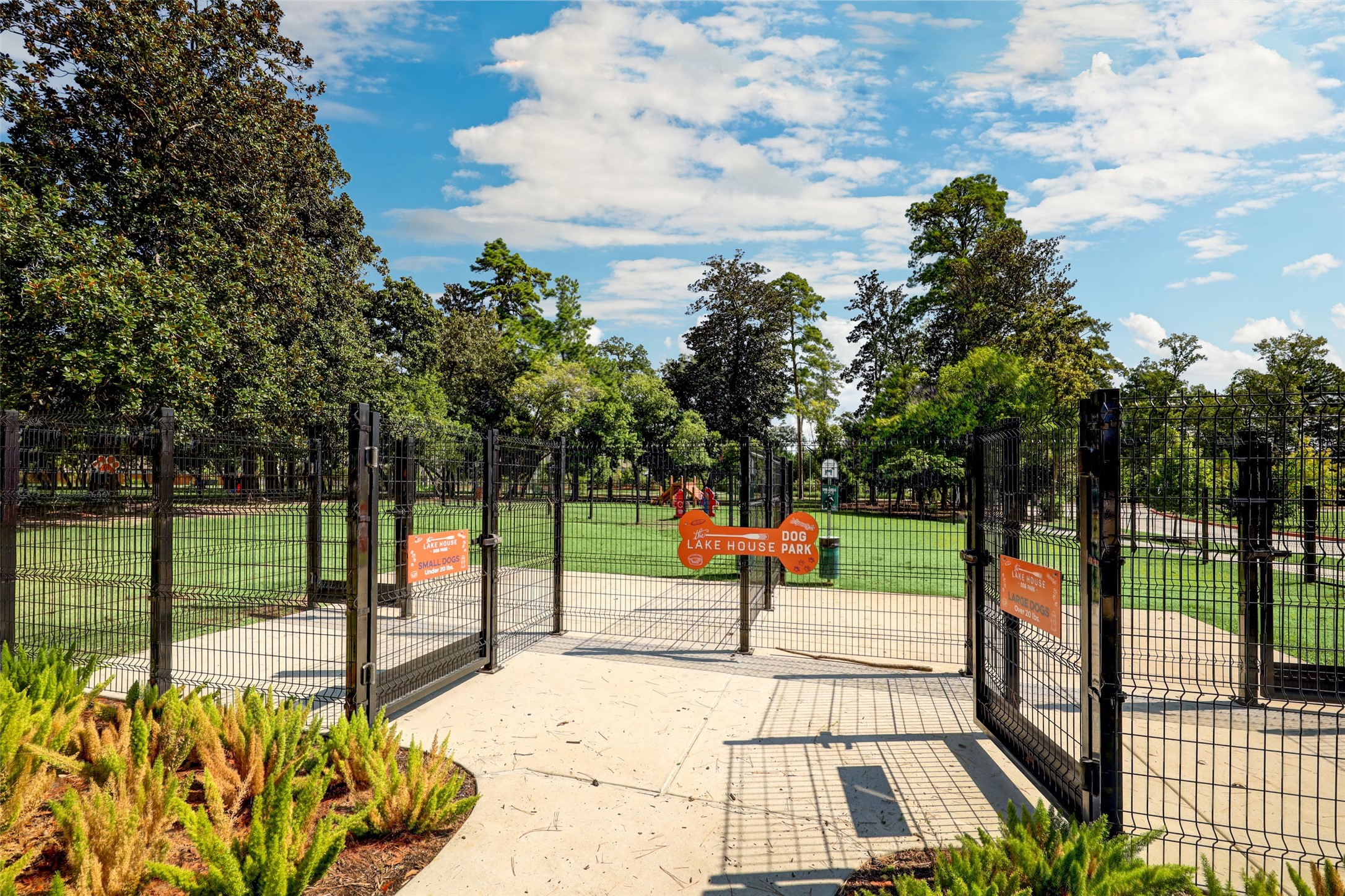 804 Fall Rock Branch Drive Conroe, TX 77304 - Photo 41 of 44 a view of a park with swings