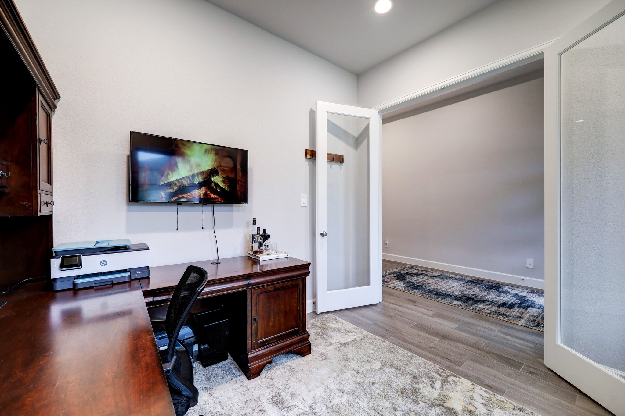 804 Fall Rock Branch Drive Conroe, TX 77304 - Photo 5 of 44 a room with furniture and a flat screen tv