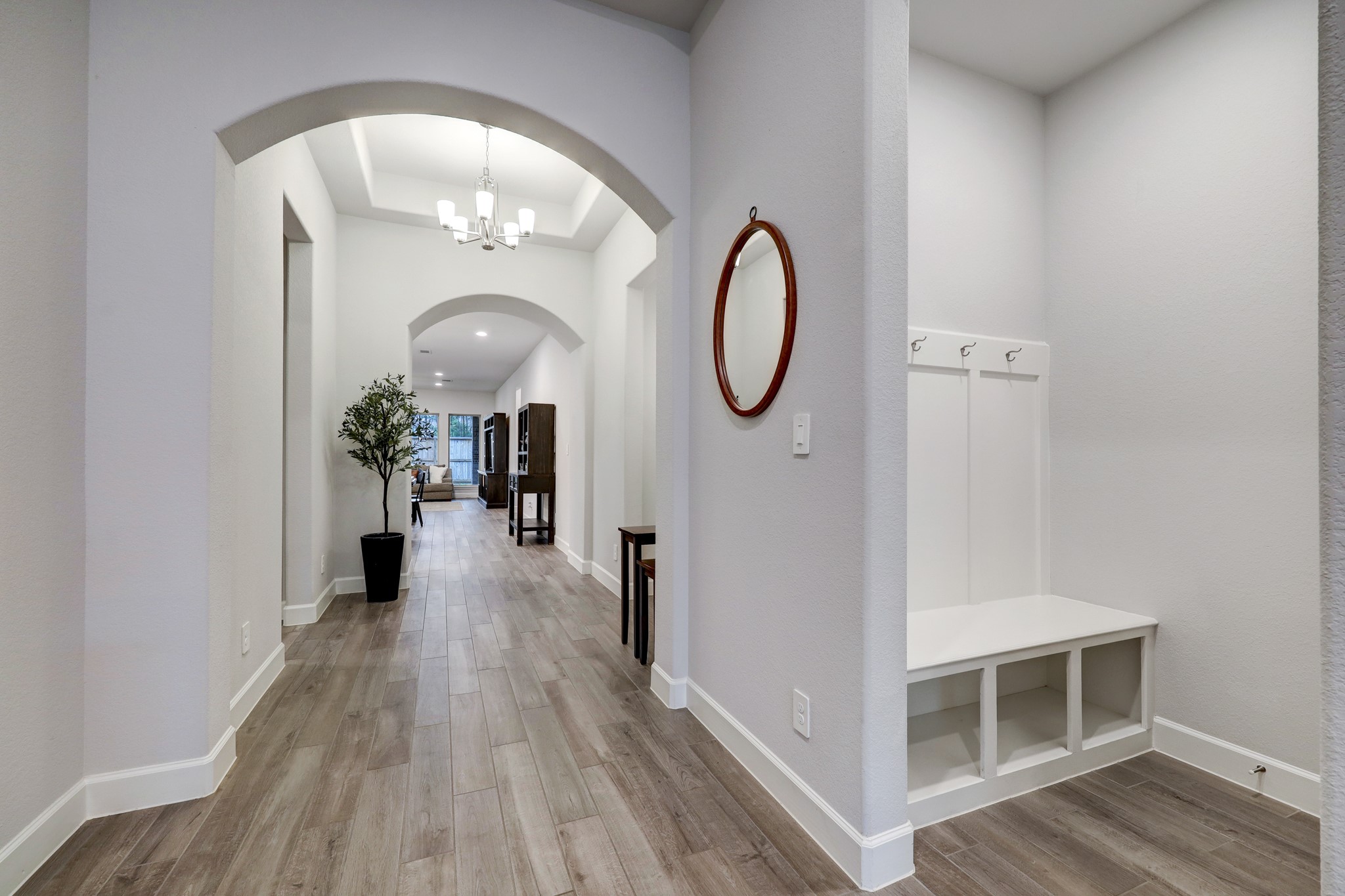 804 Fall Rock Branch Drive Conroe, TX 77304 - Photo 7 of 44 a view of a livingroom from a hallway