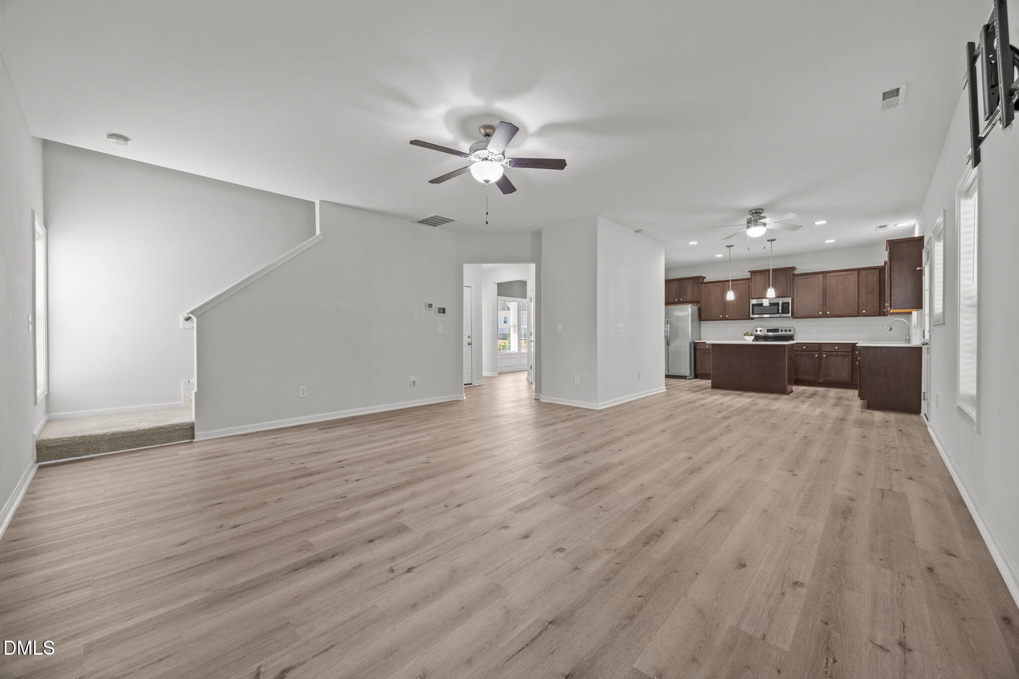 161 Starlight Road Lillington, NC 27546 - Photo 14 of 45 a view of a kitchen with a sink and a refrigerator
