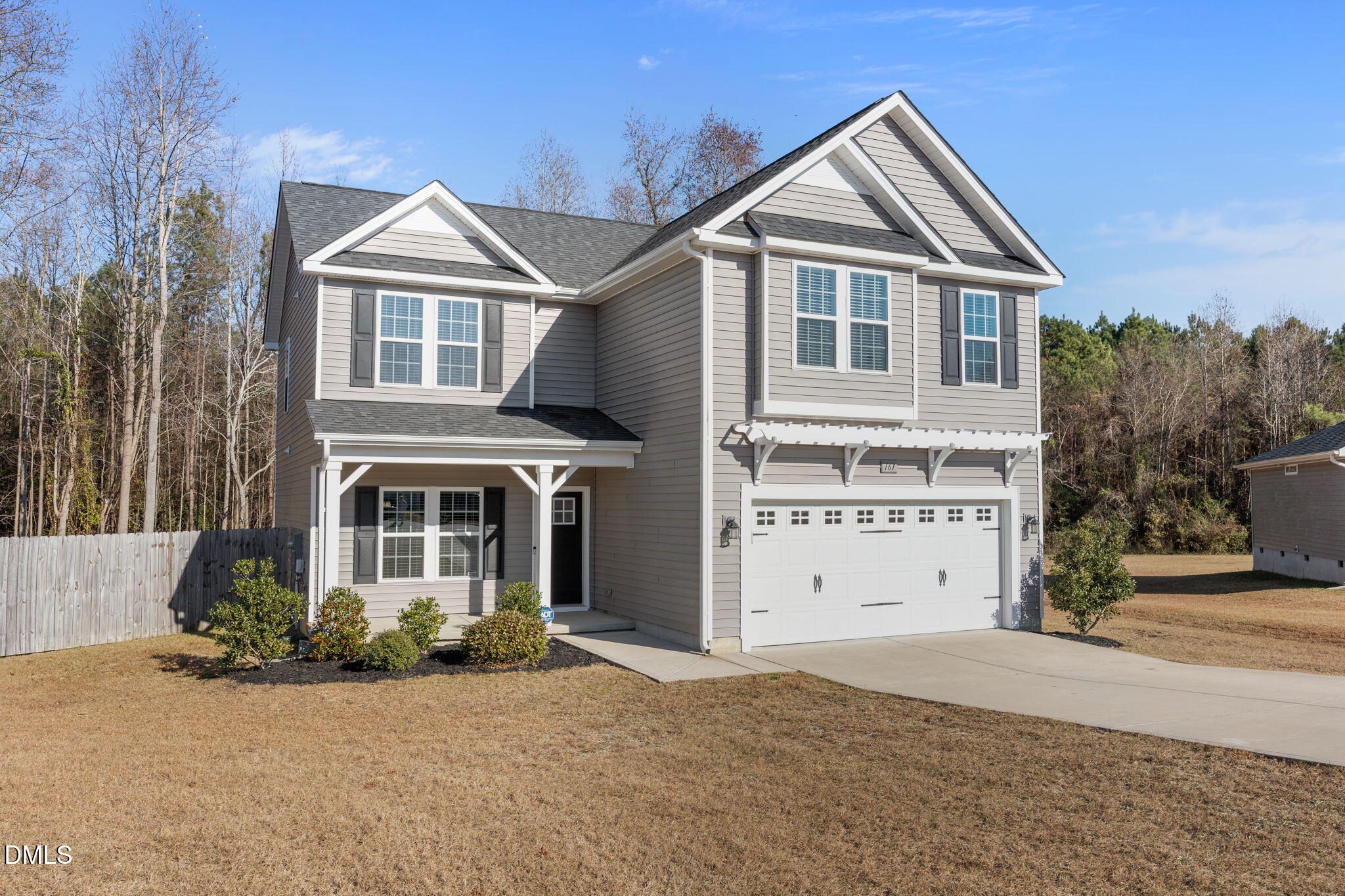 161 Starlight Road Lillington, NC 27546 - Photo 2 of 45 a view of a house with a yard