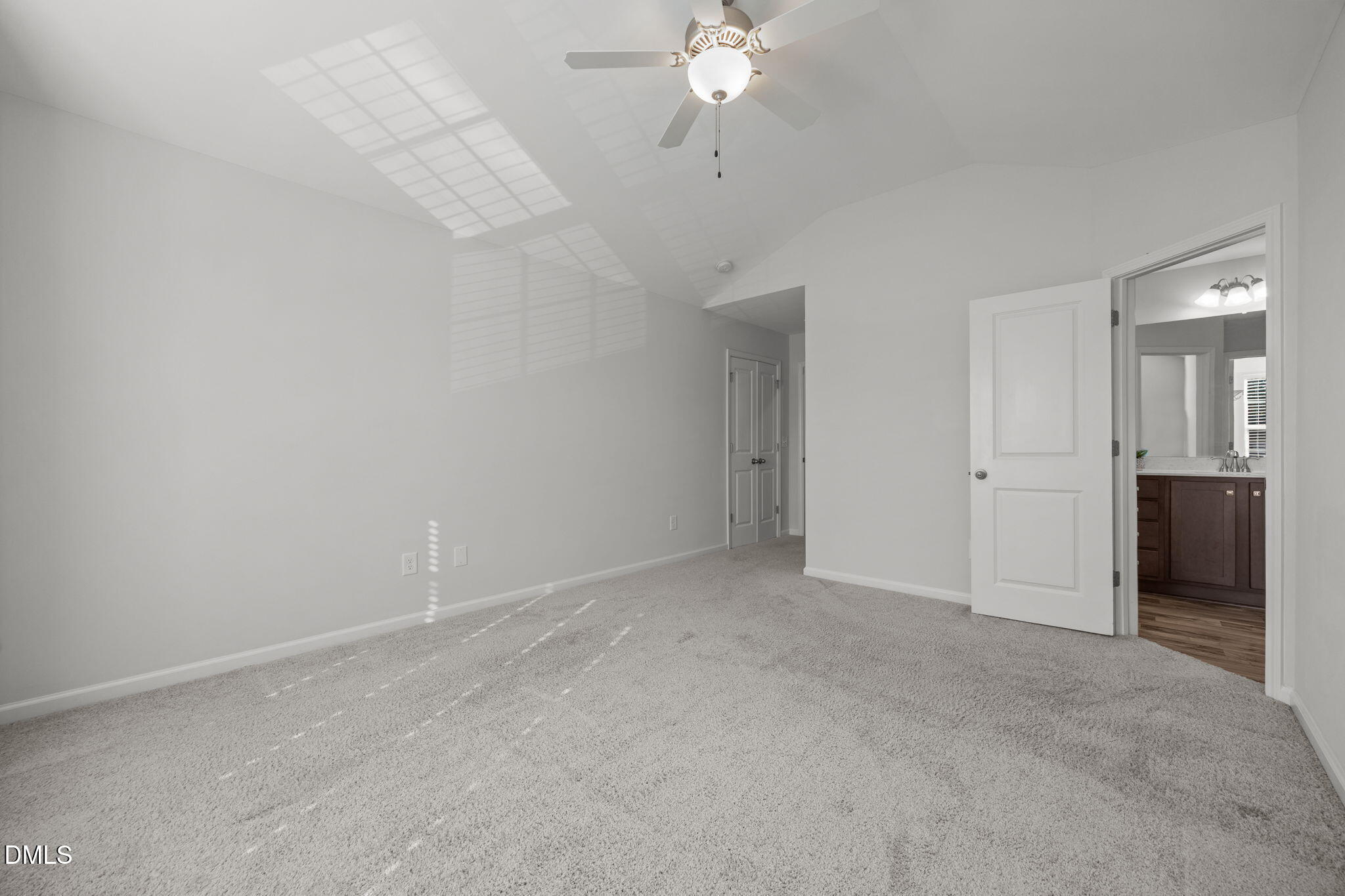 161 Starlight Road Lillington, NC 27546 - Photo 21 of 45 a view of an empty room with a chandelier fan