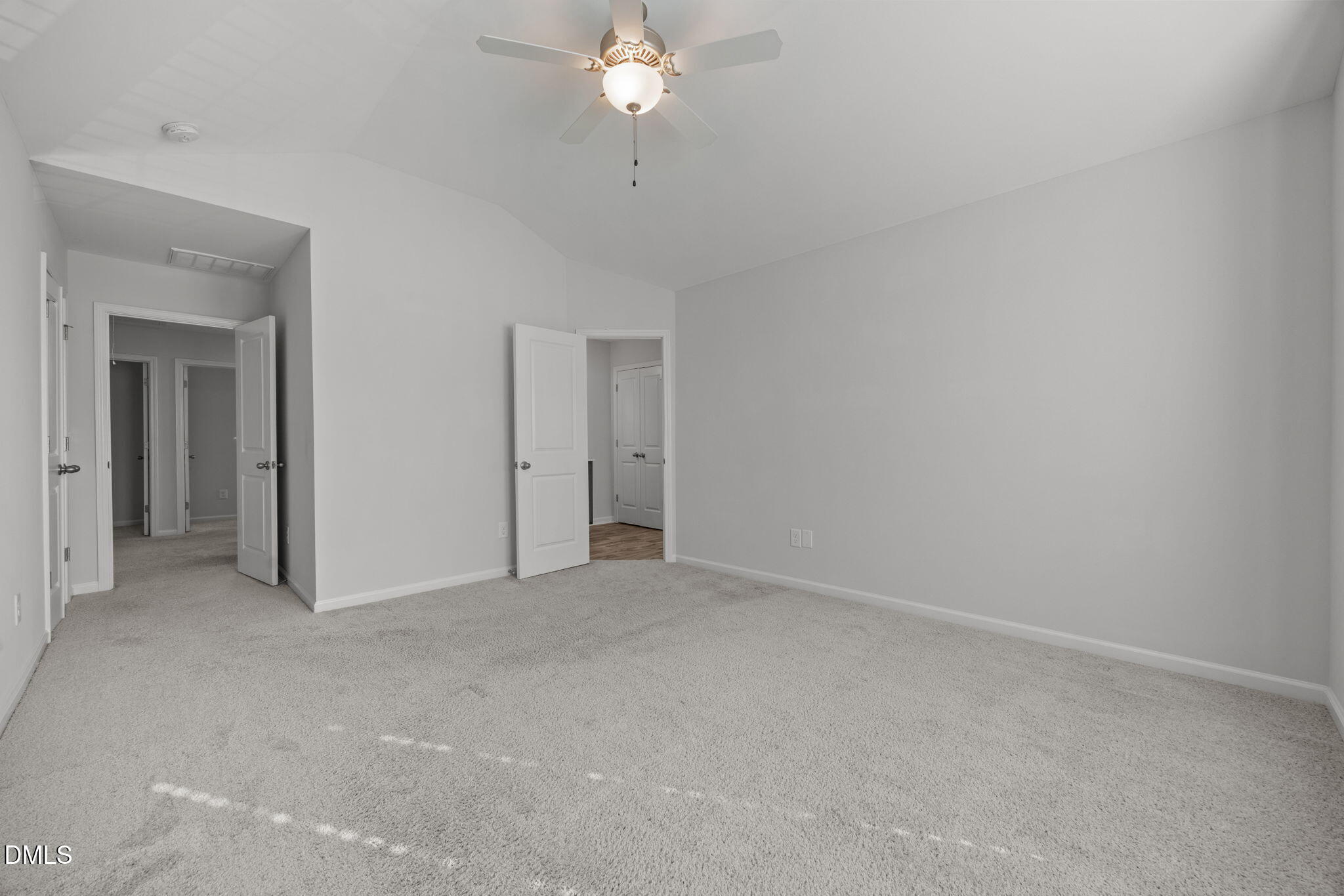 161 Starlight Road Lillington, NC 27546 - Photo 22 of 45 a view of an empty room with a chandelier fan