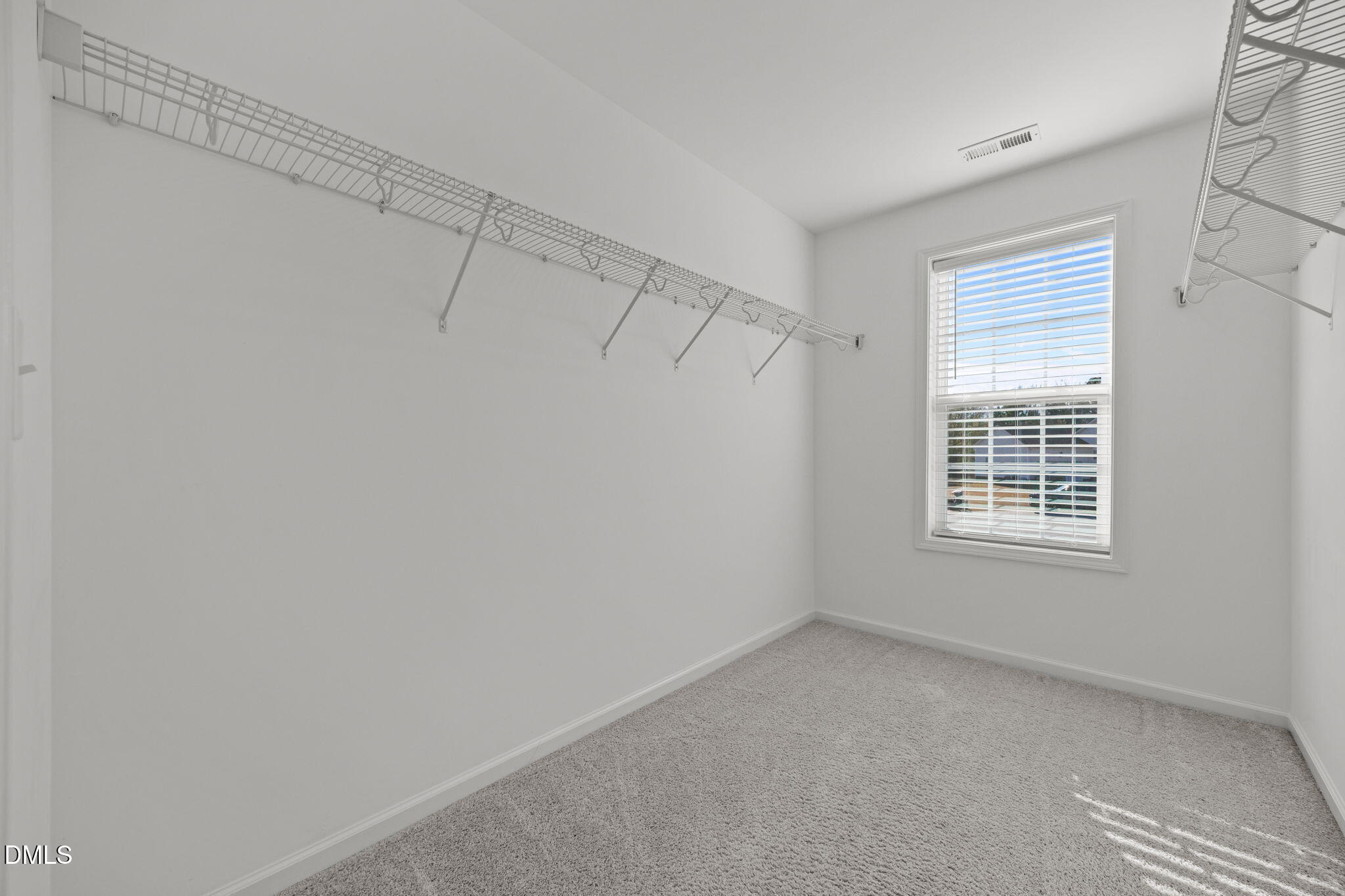 161 Starlight Road Lillington, NC 27546 - Photo 25 of 45 a view of an empty room with a window