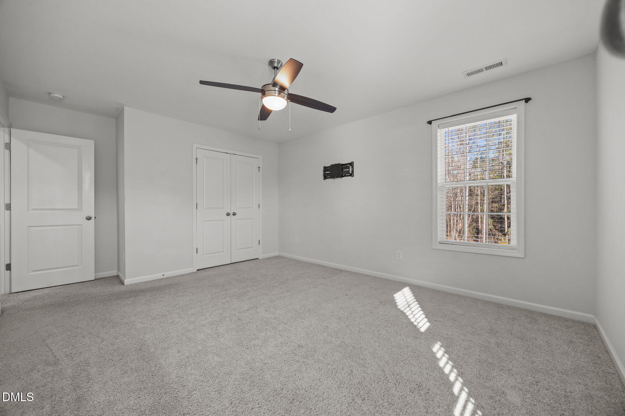 161 Starlight Road Lillington, NC 27546 - Photo 32 of 45 a view of an empty room with a window