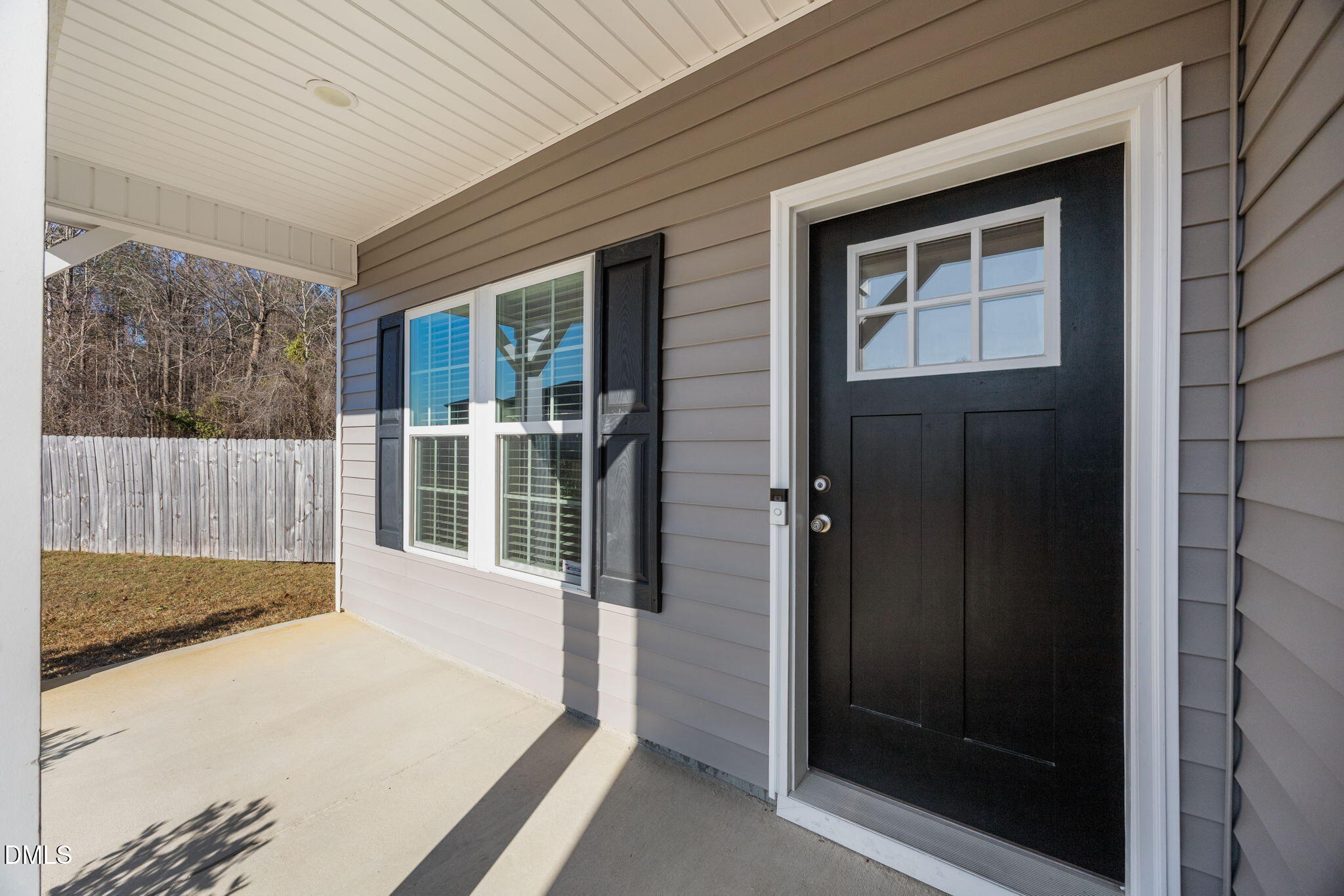 161 Starlight Road Lillington, NC 27546 - Photo 4 of 45 a view of porch with a door and wooden floor