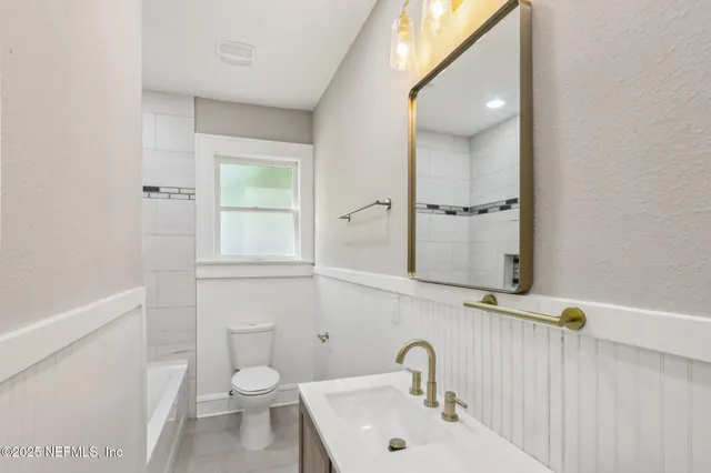 a view of a porch with wooden floor and outdoor space