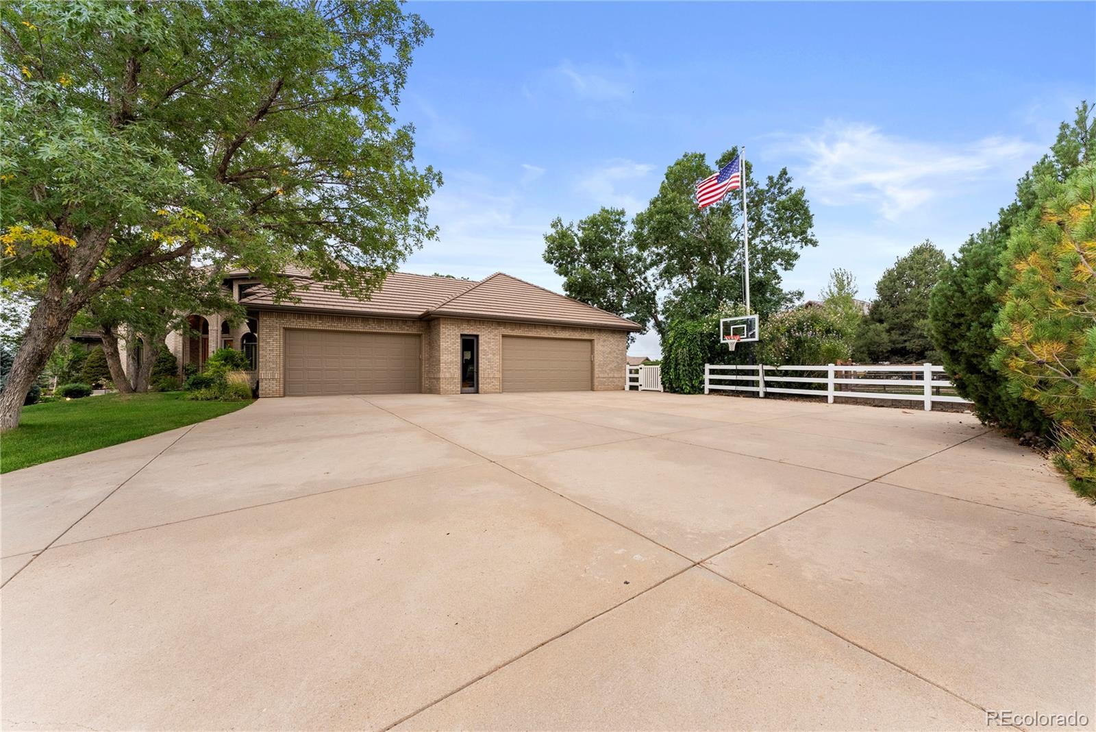 14046 Lexington Circle Westminster, CO 80023 - Photo 12 of 40 front view of a house with a street