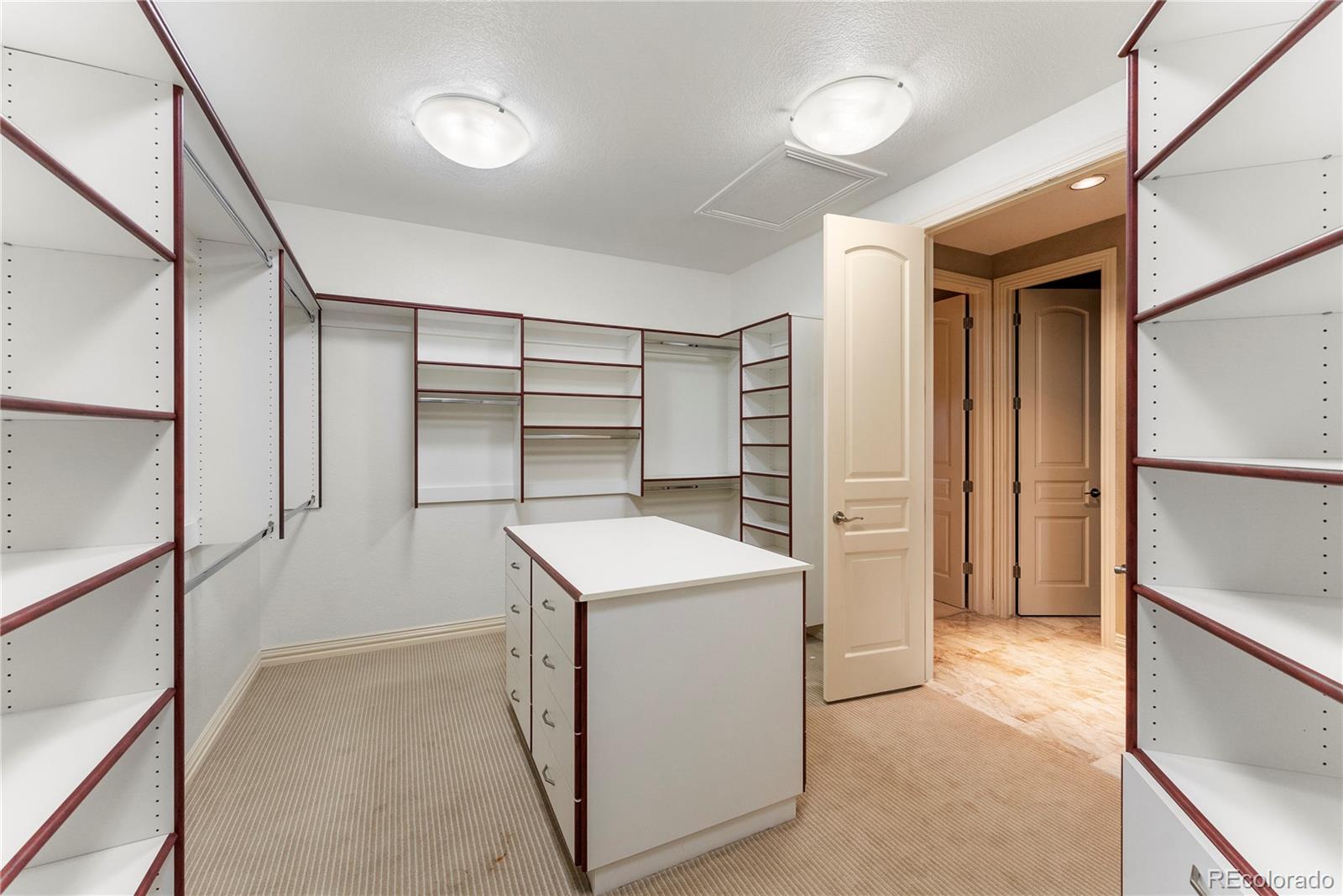 14046 Lexington Circle Westminster, CO 80023 - Photo 23 of 40 a utility room with cabinets washer and dryer