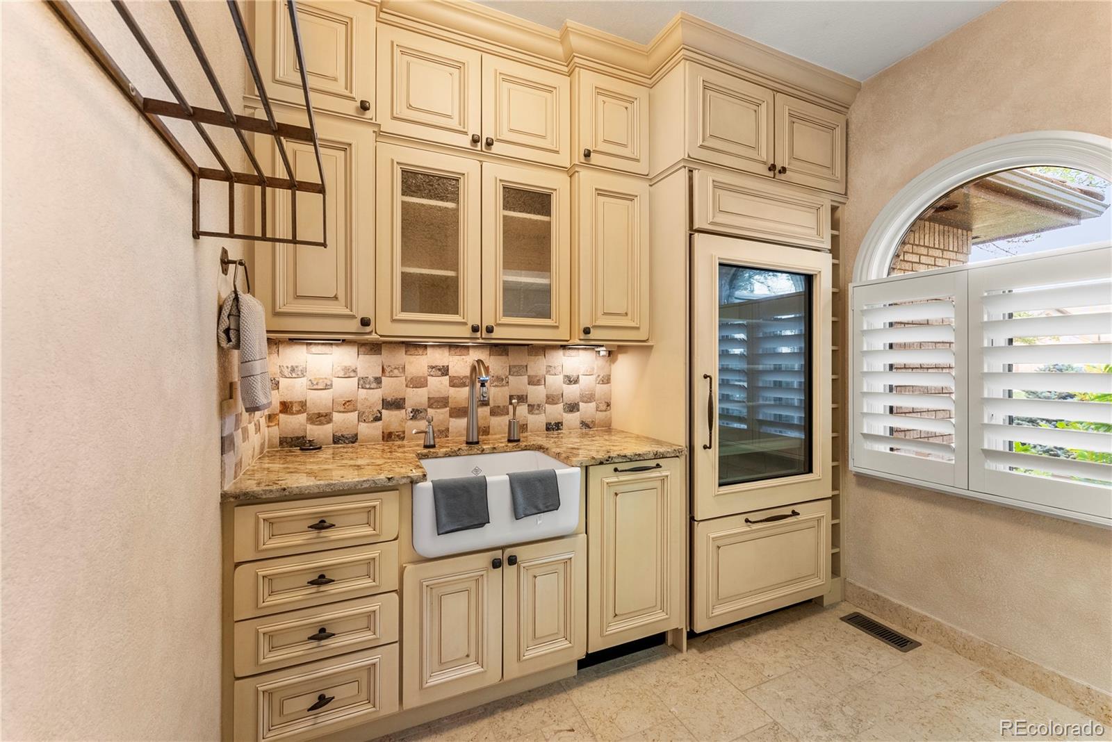 14046 Lexington Circle Westminster, CO 80023 - Photo 26 of 40 a kitchen with stainless steel appliances and cabinets