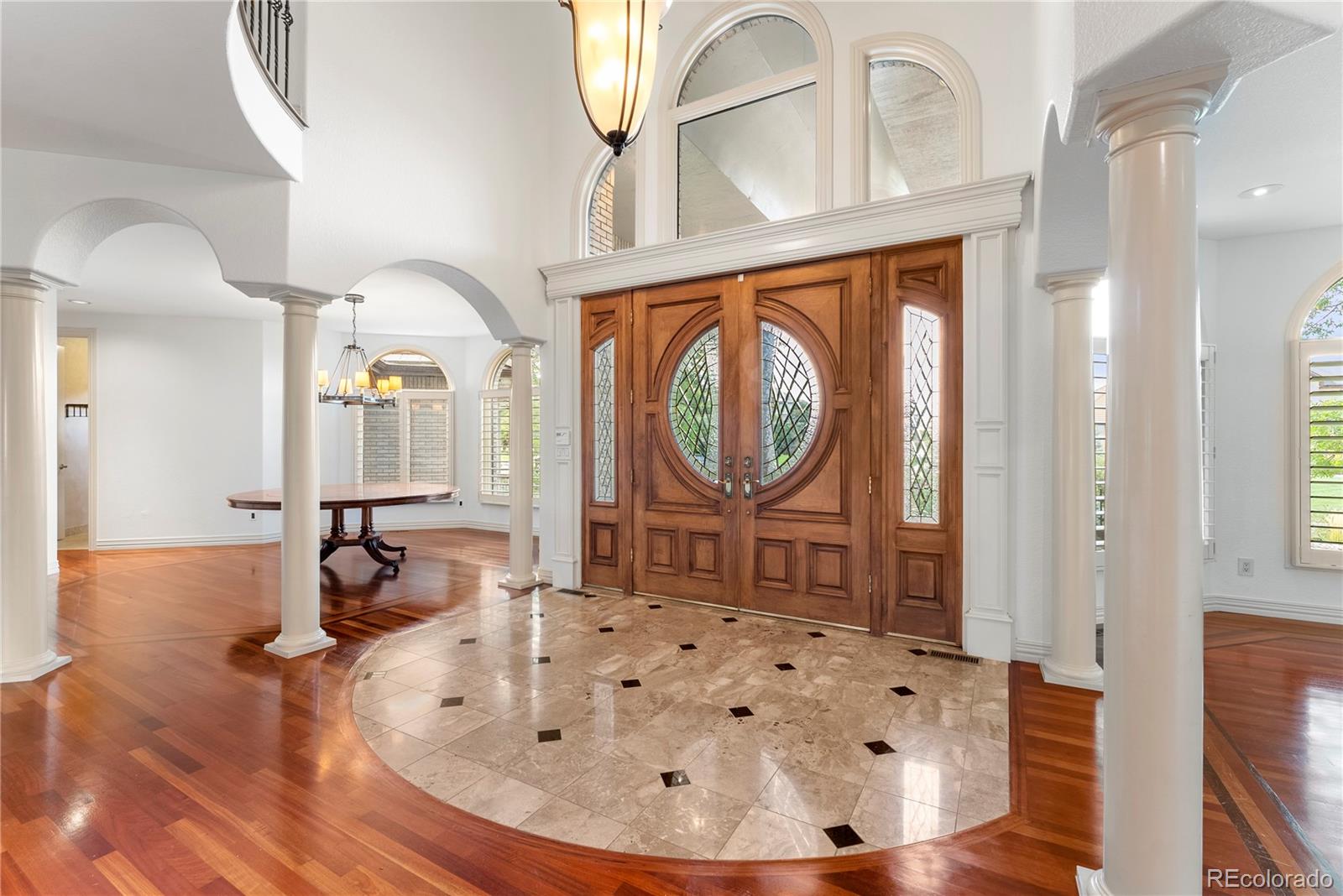 14046 Lexington Circle Westminster, CO 80023 - Photo 27 of 40 a view of a livingroom with furniture mirror and window