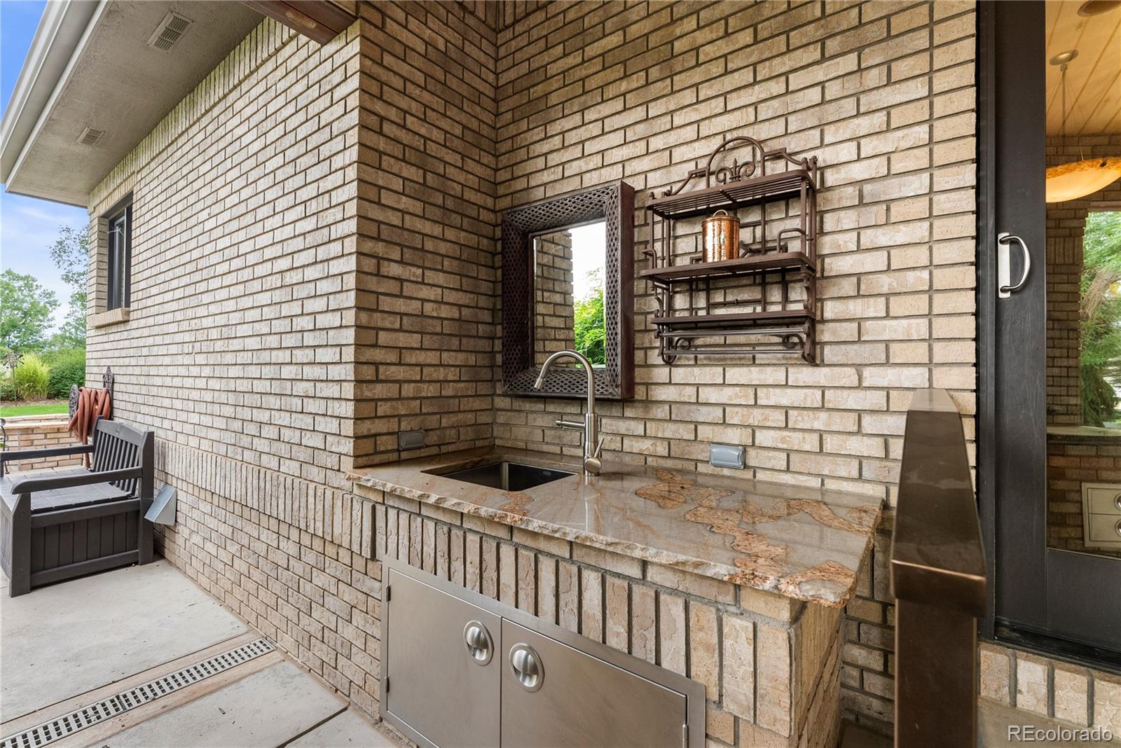 14046 Lexington Circle Westminster, CO 80023 - Photo 30 of 40 a view of house and front door