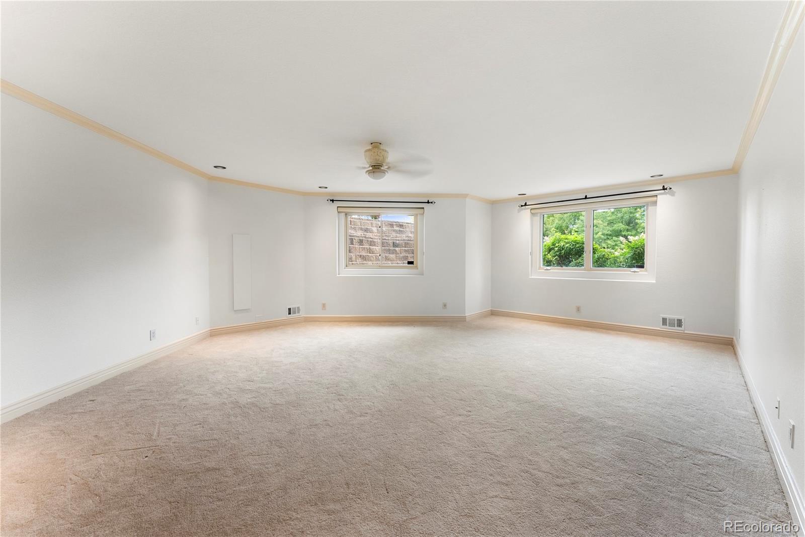 14046 Lexington Circle Westminster, CO 80023 - Photo 33 of 40 an empty room with windows