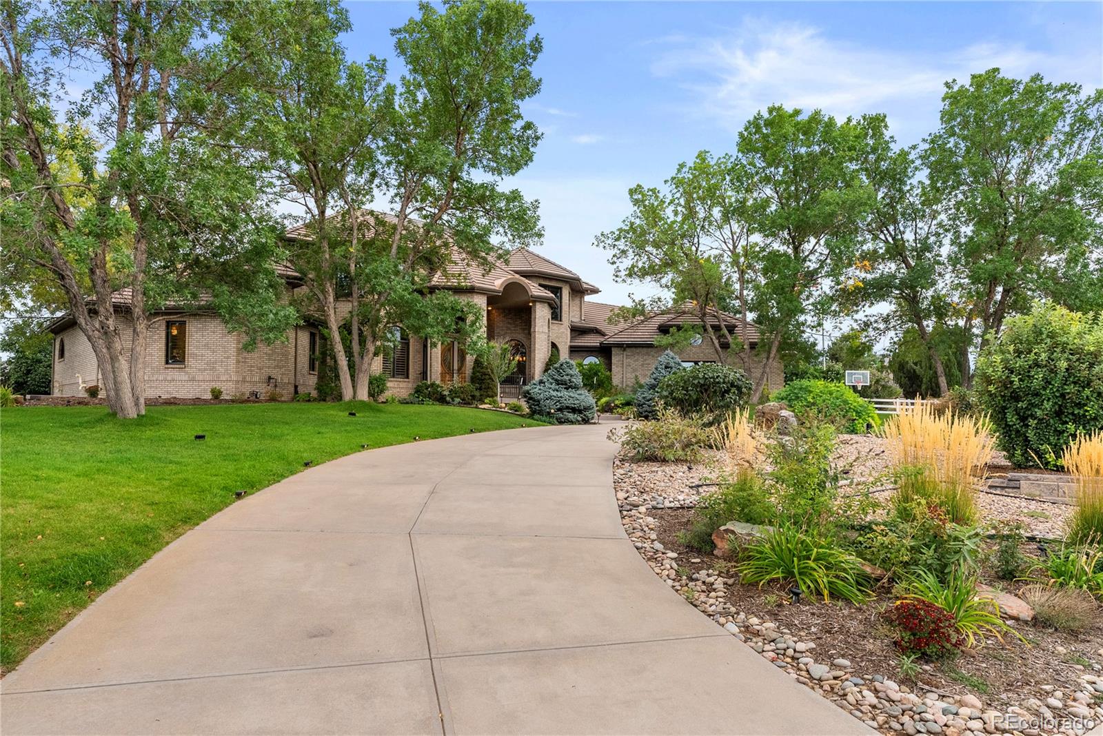 14046 Lexington Circle Westminster, CO 80023 - Photo 39 of 40 a view of a house with a yard
