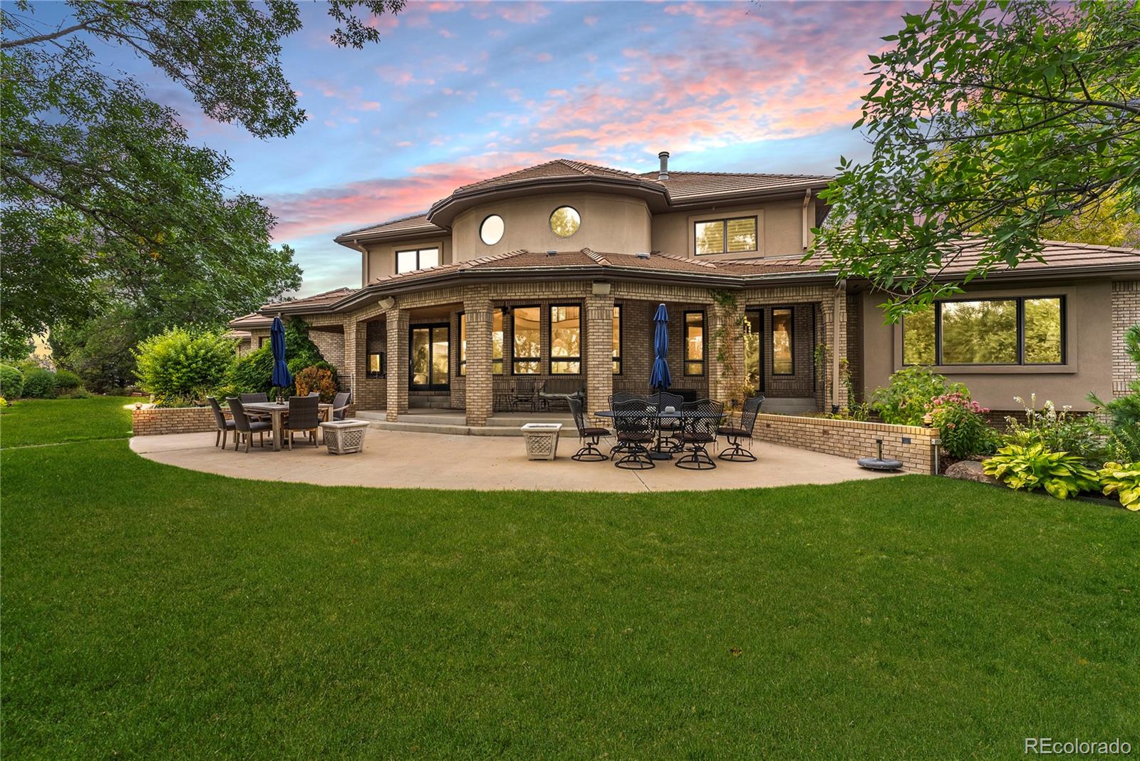 14046 Lexington Circle Westminster, CO 80023 - Photo 4 of 40 a view of a building with a yard