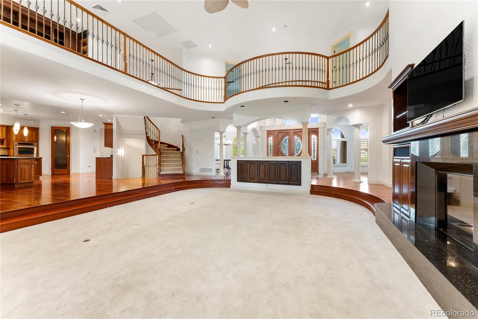 14046 Lexington Circle Westminster, CO 80023 - Photo 5 of 40 a view of an entryway with a kitchen
