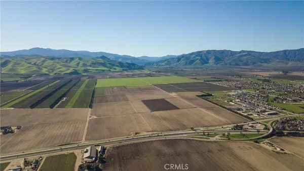 a view of a field with an outdoor space