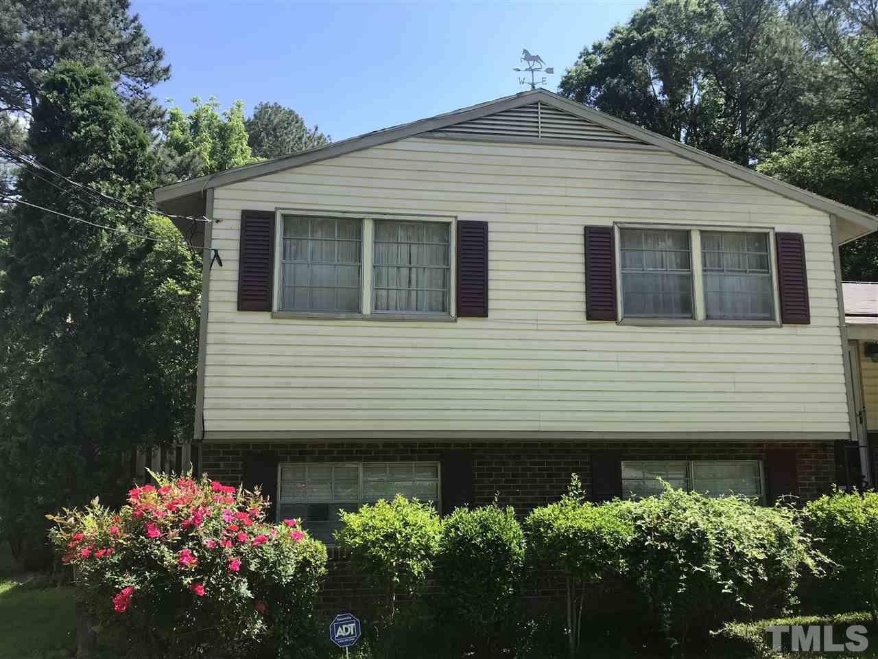 1909 Tee Dee Street Raleigh, NC 27610 - Photo 17 of 17 a house with a yard