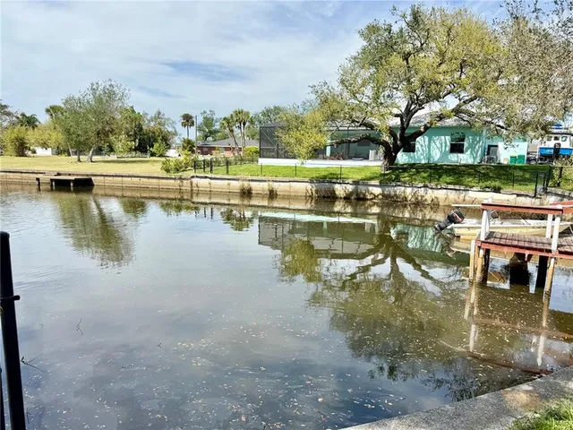 a view of a lake with a house