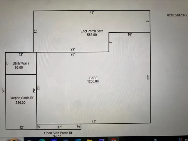 a kitchen with cabinets and wooden floor