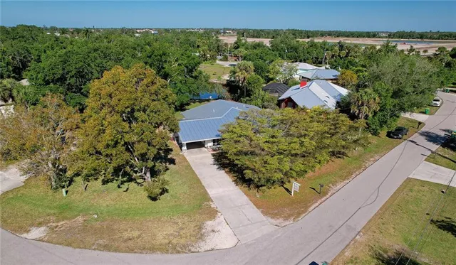a backyard of a house with lots of green space